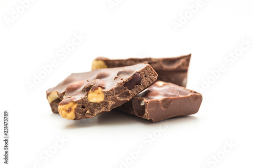 Chocolate pieces on white background