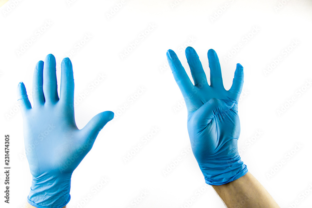 Male hand in medical glove on white background. Male hand in medical glove on white background.