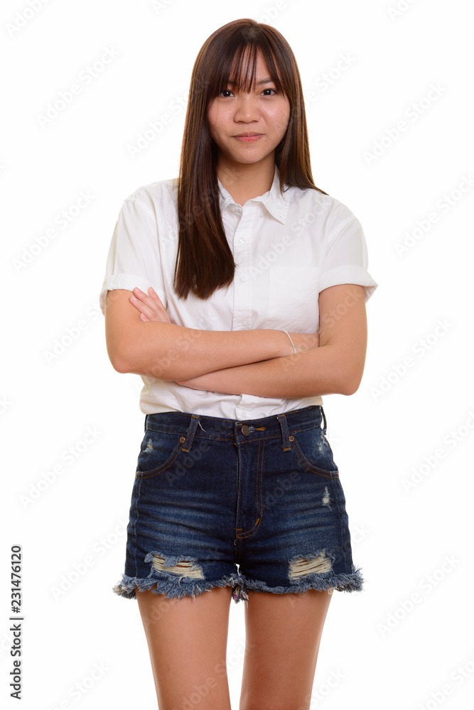 Portrait of young cute Asian teenage girl