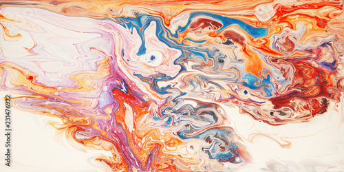 Colorful orange and blue wavy texture. Abstract acrylic painting. Fluid art. © Klavdiya Krinichnaya