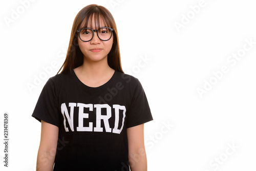 Portrait of young cute Asian nerd teenage girl