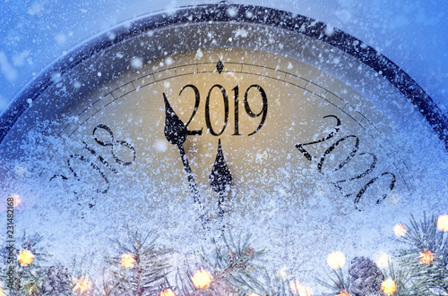 Countdown to midnight. Retro style clock counting last moments before Christmass or New Year 2019.
