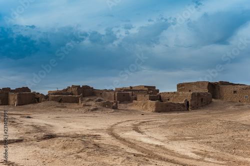 Ruined house in smal village in the Sahara desert near Merzouga in Morocco