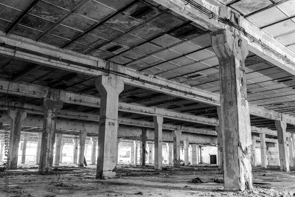 Abandoned factory interior in Romania in black and white, after the communist regim most of the factories were abandoned. Abandoned factory interior in Romania in black and white, after the communist regim most of the factories were abandoned.