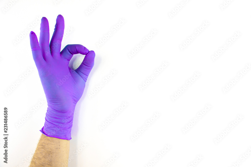 Male hand in medical glove on white background.