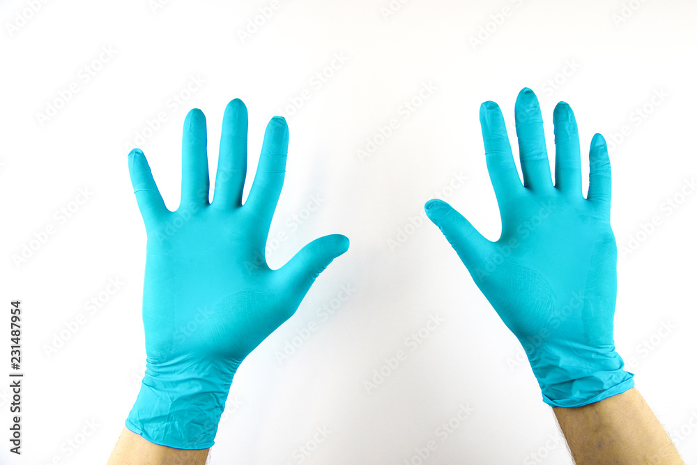 Male hand in medical glove on white background. Male hand in medical glove on white background.