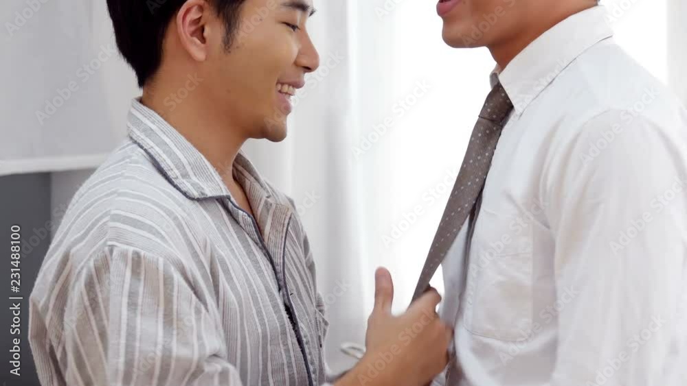 Man takecare to him boyfriend at home. People with gay, homosexual, lifestyle and relationship concept. Man takecare to him boyfriend at home. People with gay, homosexual, lifestyle and relationship concept.