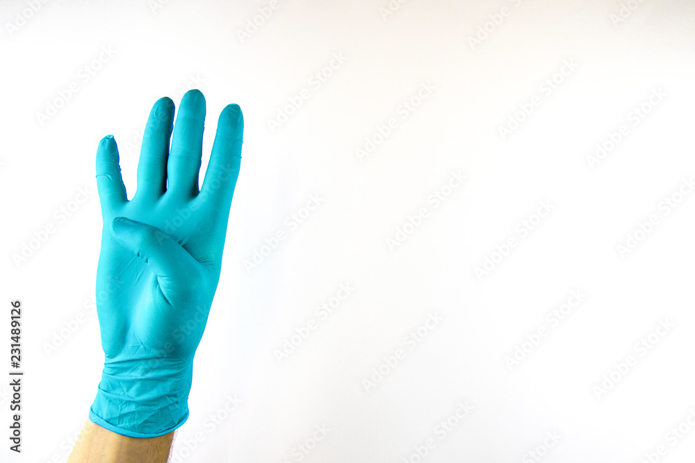 Male hand in medical glove on white background. Male hand in medical glove on white background.