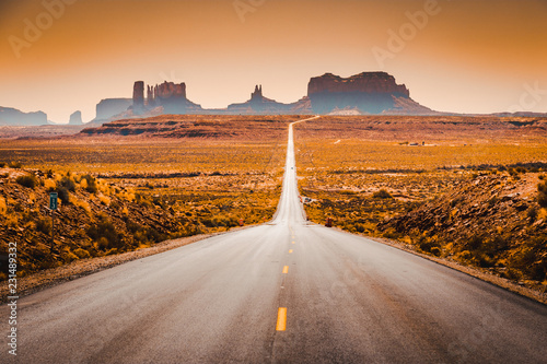 Classic highway view in Monument Valley at sunset, USA photo