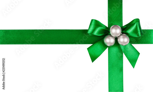Green bow, ribbon with christmas balls. Isolated on white background.