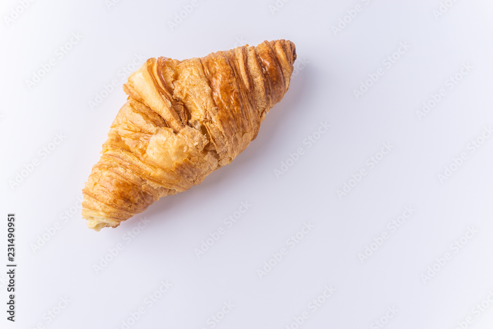 Plain croissant on white background