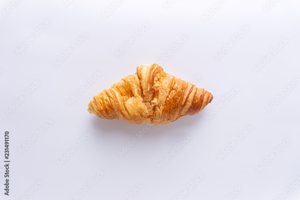 Plain croissant on white background