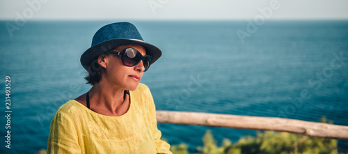 Portrait of a woman with blue hat © kerkezz