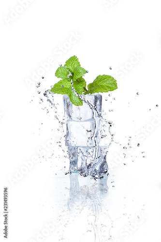 ice cubes and splashing water with mint on a white background
