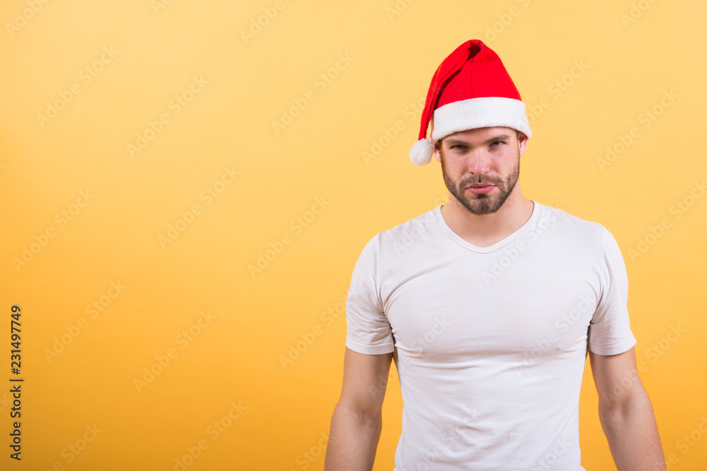 online christmas shopping. Happy new year, copy space. The morning before Xmas. happy santa man on yellow background. delivery christmas gifts. man in santa hat wait for christmas present