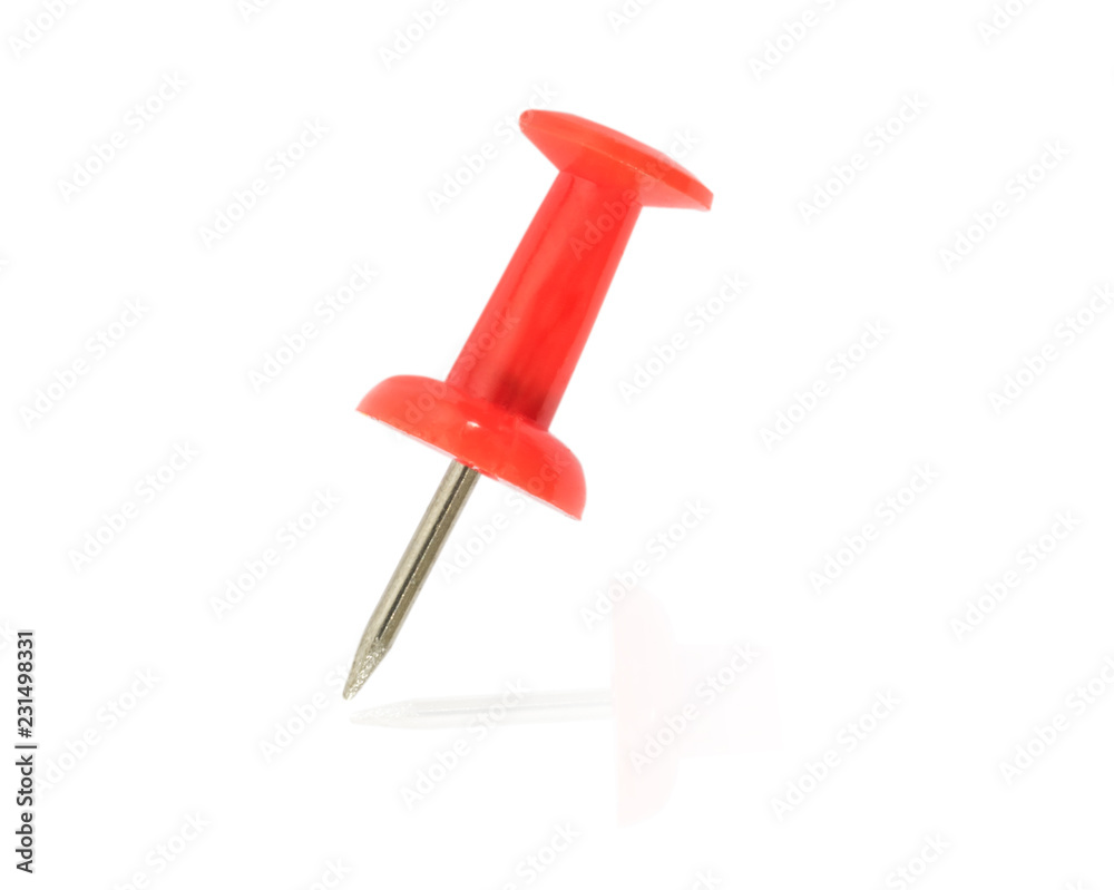 Red Pushpin close up on an isolated background Red Pushpin close up on an isolated background