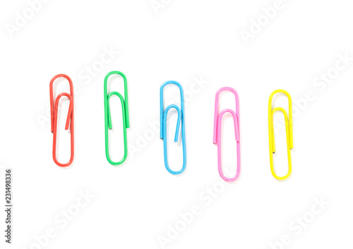 Colored paperclips isolated on white background