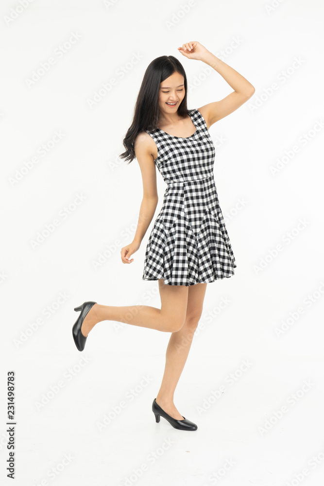 portrait of excited surprised attractive inspired girl jumping up isolated on background.Freedom legs stylish feet glamorous people teenager asian. portrait of excited surprised attractive inspired girl jumping up isolated on background.Freedom legs stylish feet glamorous people teenager asian.