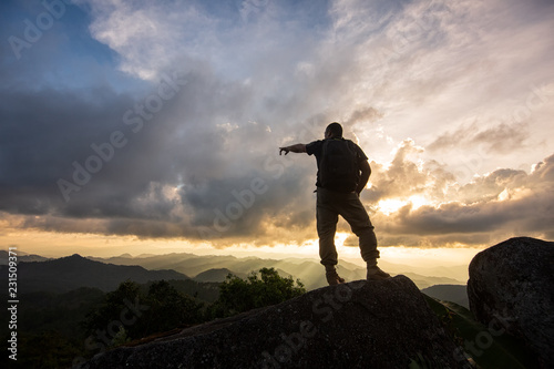 Silhouette of a man in mountains