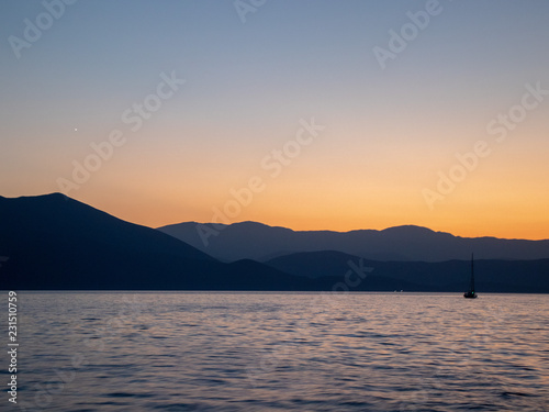 Moody sunset scenery of yachts taken at aegean sea in greece on the sporades Island - Skopelos  Alonisos  Skiathos
