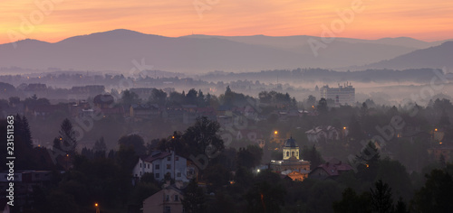 Panorama of the city against the backdrop of a mountain landscape in the morning, Cieszyn, Poland photo