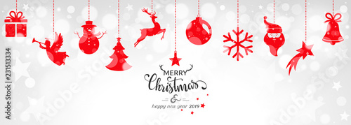 Christmas card 2019 with hanging decorations on bokeh