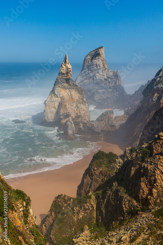 Beautiful landscape of Ursa beach (Praia da Ursa) on a foggy morning, near Cabo da Roca, Portugal.