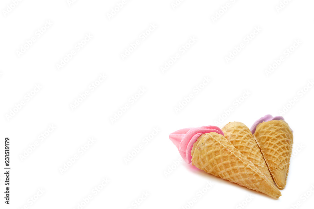Meringues in mini cone ice cream isolated on white background. Meringues in mini cone ice cream isolated on white background.