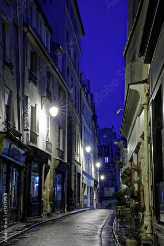Paris  France - November 1  2018  View of a street at blue hour after rain in Paris