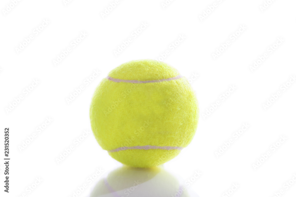 Tennis ball isolated on pure white background with reflection