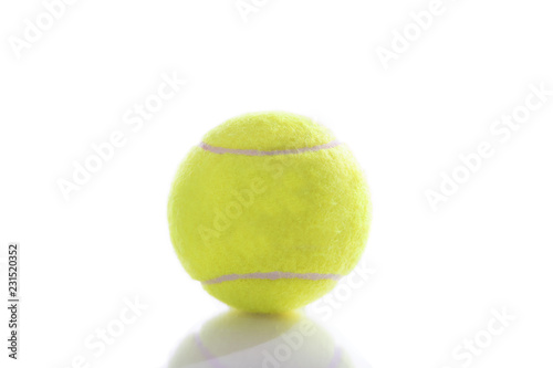 Tennis ball isolated on pure white background with reflection © tab62