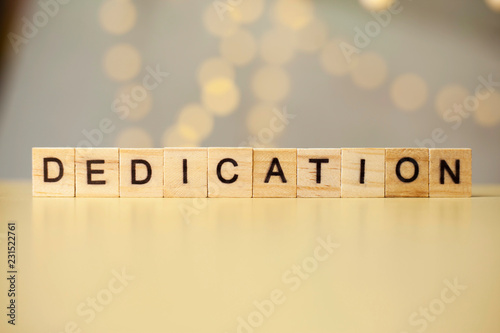 Dedication, Motivational Words Quotes Concept photo