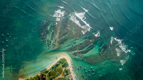 Beautiful aerial view of tropical coastline and fisherman village