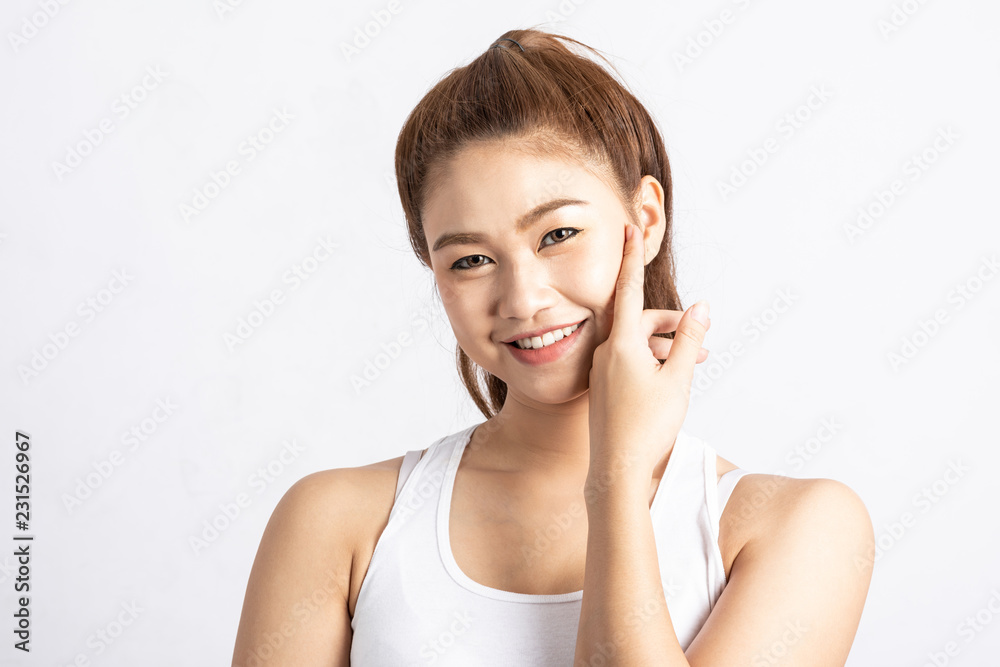 Beautiful Attractive Charming Asian young woman smile with white teeth and touching soft cheek feeling so happiness and cheerful,isolated on white background,Beauty Concept Beautiful Attractive Charming Asian young woman smile with white teeth and touching soft cheek feeling so happiness and cheerful,isolated on white background,Beauty Concept