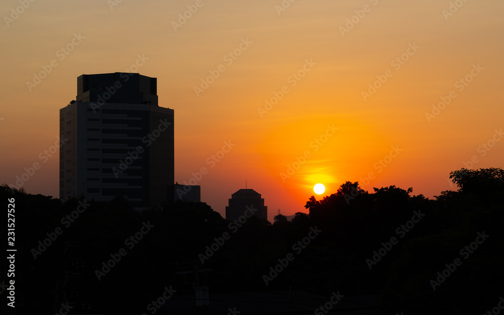 Sunset with building silhouette Sunset with building silhouette