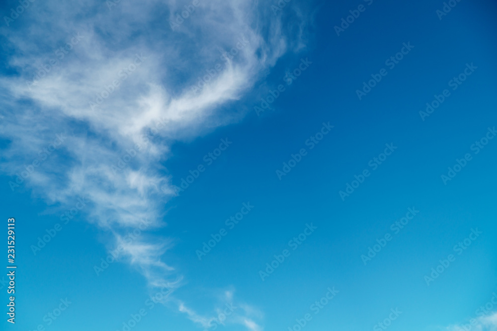Blue sky with interesting shaped clouds Blue sky with interesting shaped clouds