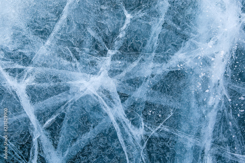cracked texture of ice on Baikal lake, Winter
