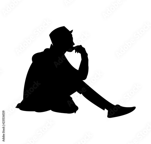 Young man sitting on ground and thinking, isolated on white background