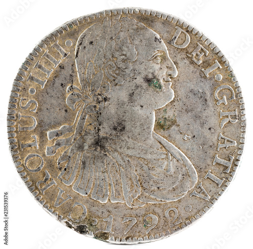 Ancient Spanish silver coin of the King Carlos IV. 1792. Coined in Mexico. 8 Reales. Obverse. photo