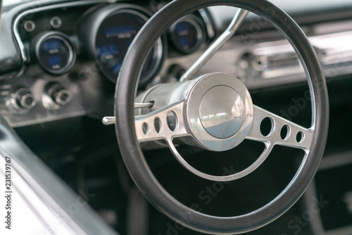 Close up of driver's wheel of vintage car