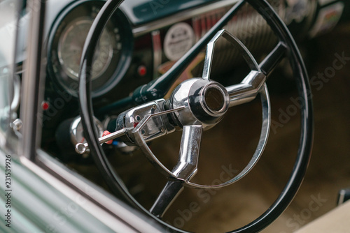 Close up of driver's wheel of vintage car © Roberto Vivancos