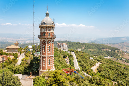 Old water tower called Torre Dos Rius on the Tibidabo hill in Barcelona photo