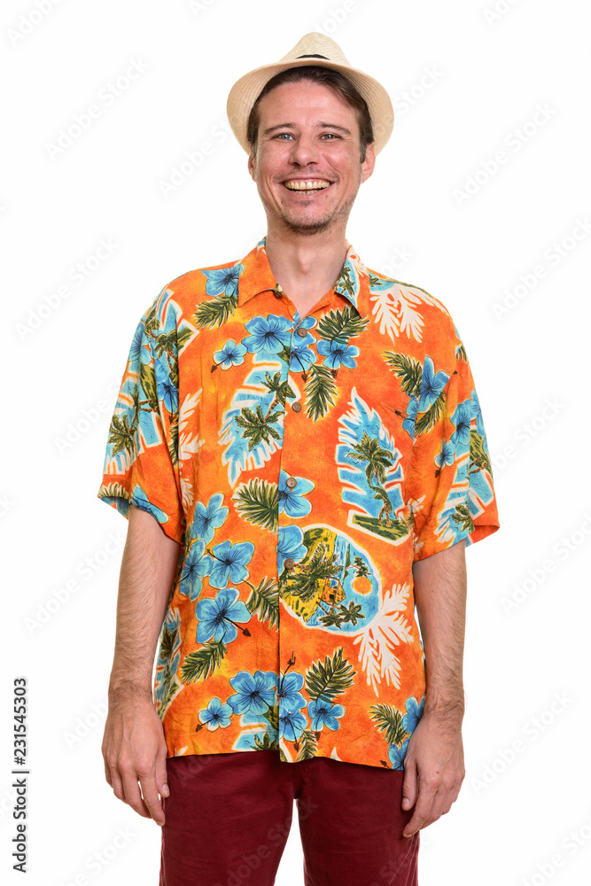 Happy Caucasian tourist man smiling and looking at camera Happy Caucasian tourist man smiling and looking at camera