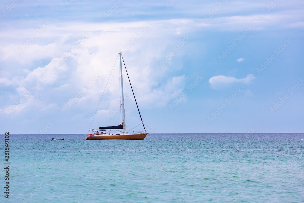 Fototapeta premium Sailing ship luxury yacht with white sails in the Sea.