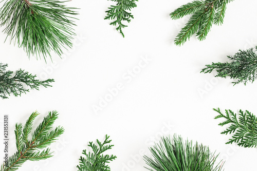 Christmas composition. Coniferous tree branches on white background. Christmas, winter, new year concept. Flat lay, top view, copy space