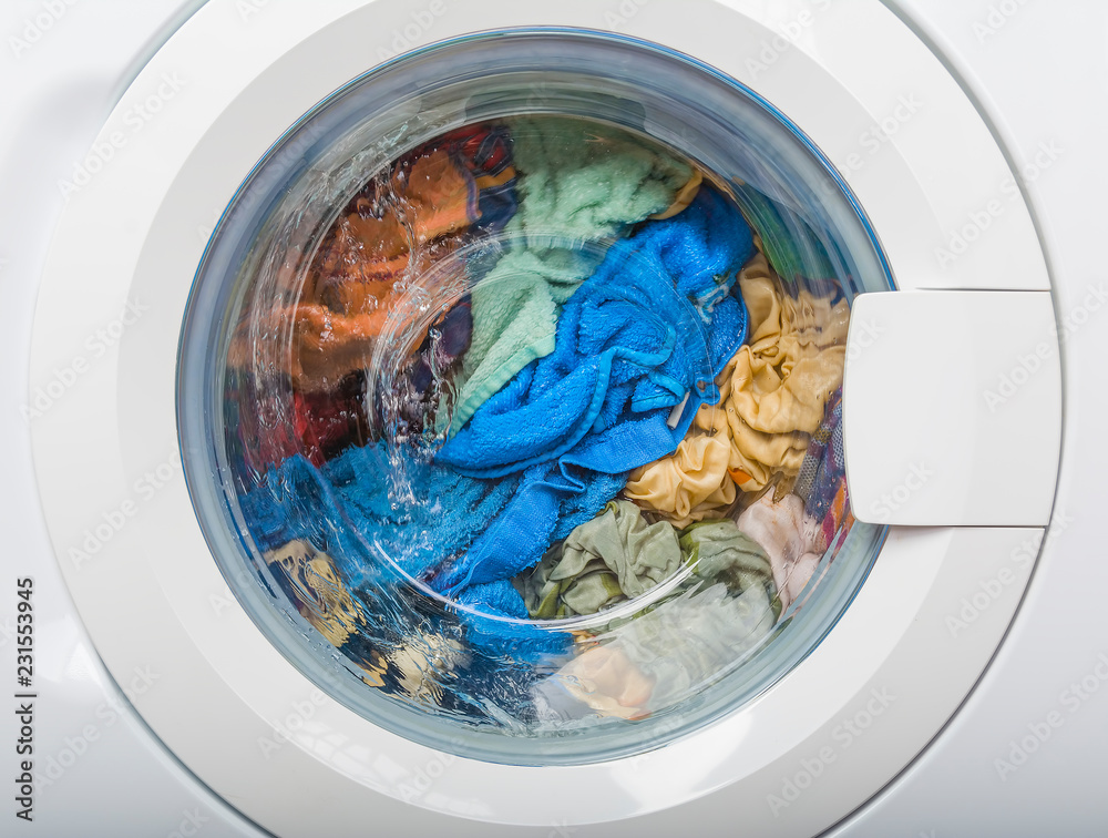 Dirty Laundry In The Washing Machine, Close-Up Dirty Laundry In The Washing Machine, Close-Up