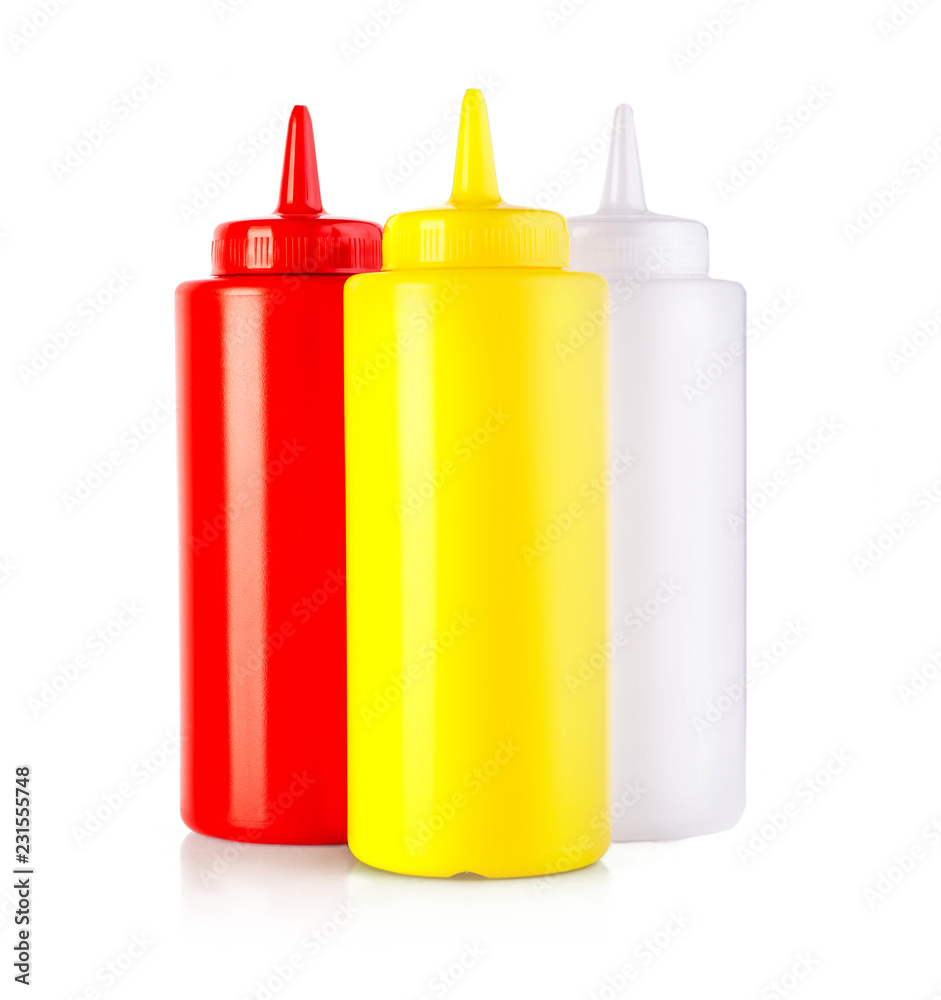 three plastic sauce bottles isolated on a white three plastic sauce bottles isolated on a white