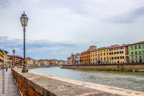 monuments and buildings in Pisa on the Arno river in Tuscany © tmag