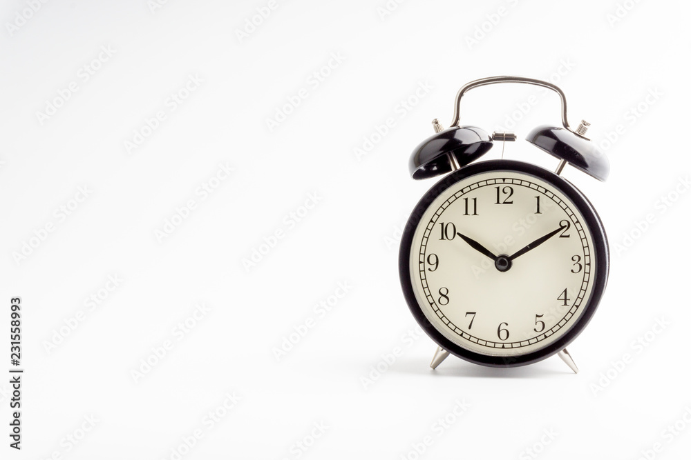 Clock isolated on white background with selective focus and crop fragment Clock isolated on white background with selective focus and crop fragment