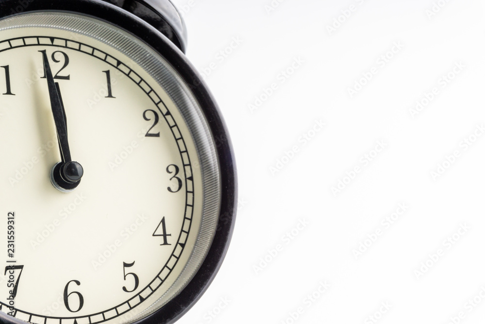 Clock isolated on white background with selective focus and crop fragment Clock isolated on white background with selective focus and crop fragment